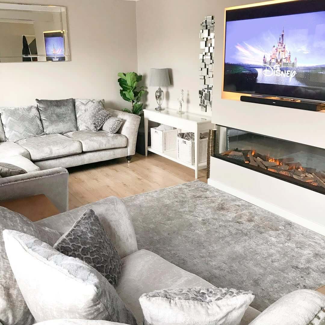 Mirror Panel Wall Art Adds Vertical Interest Above Fireplace