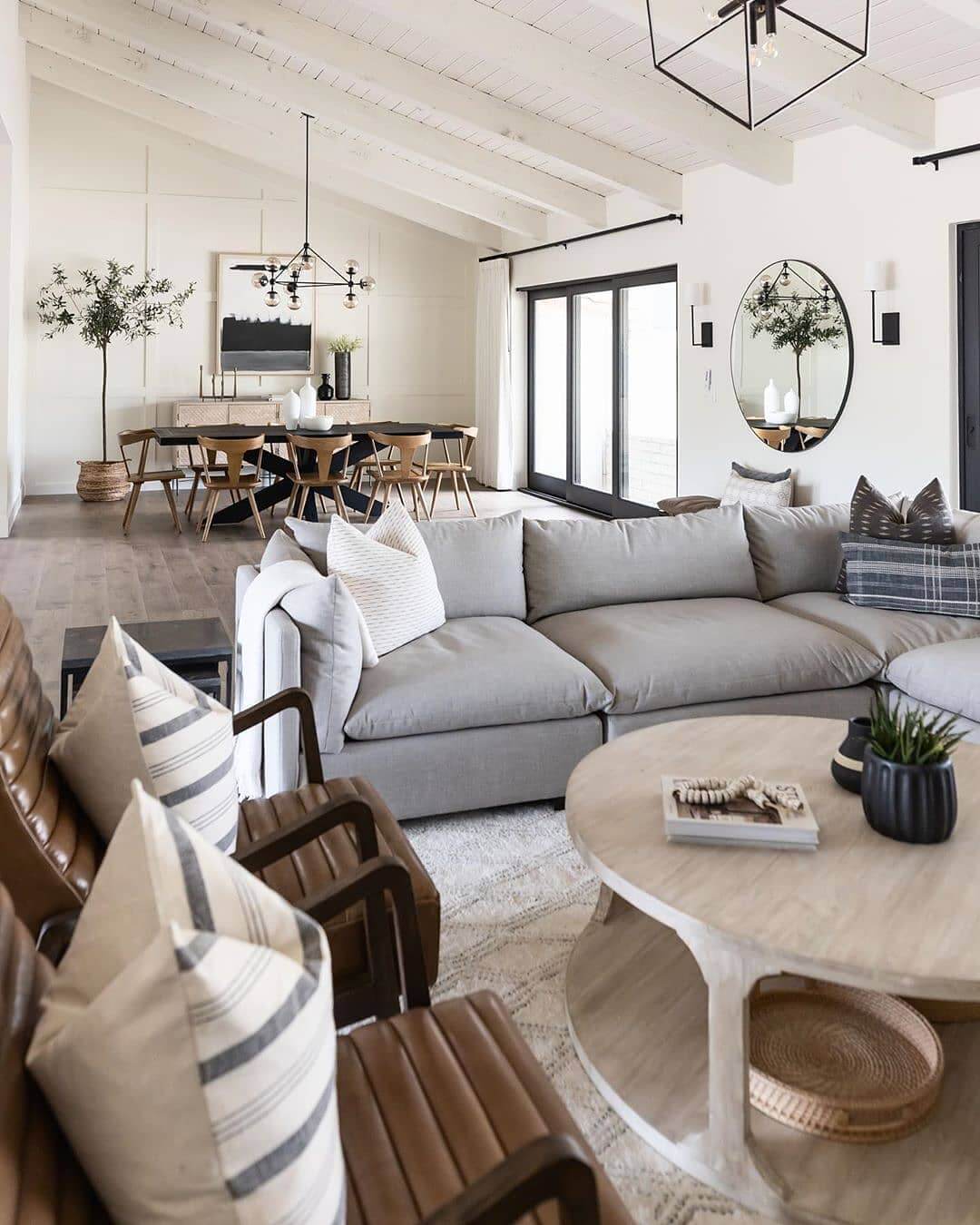 Ground Open-Concept Spaces with Neutral Textured Rugs