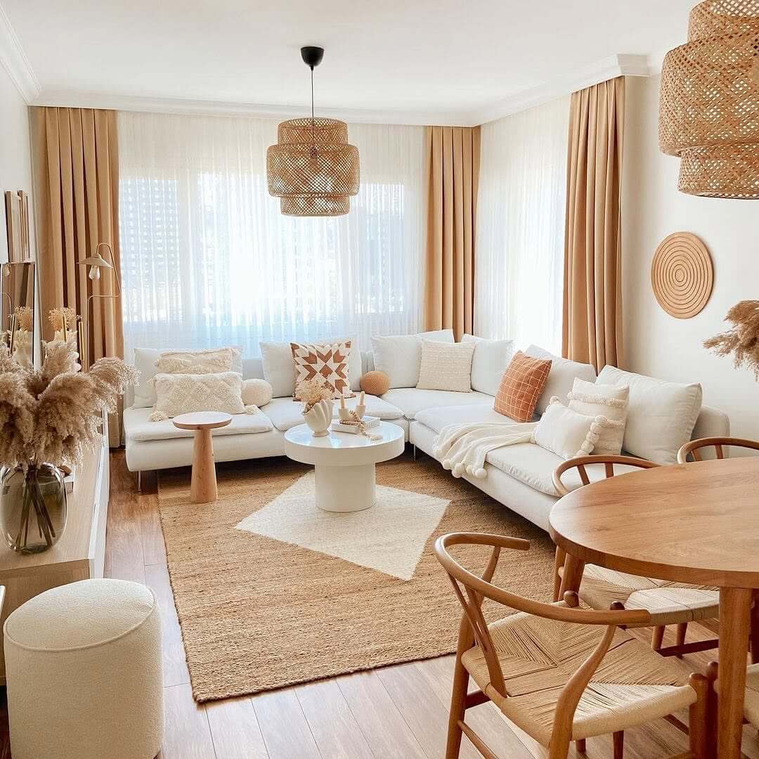 Layered Jute and Cream Rugs Define the Seating Area