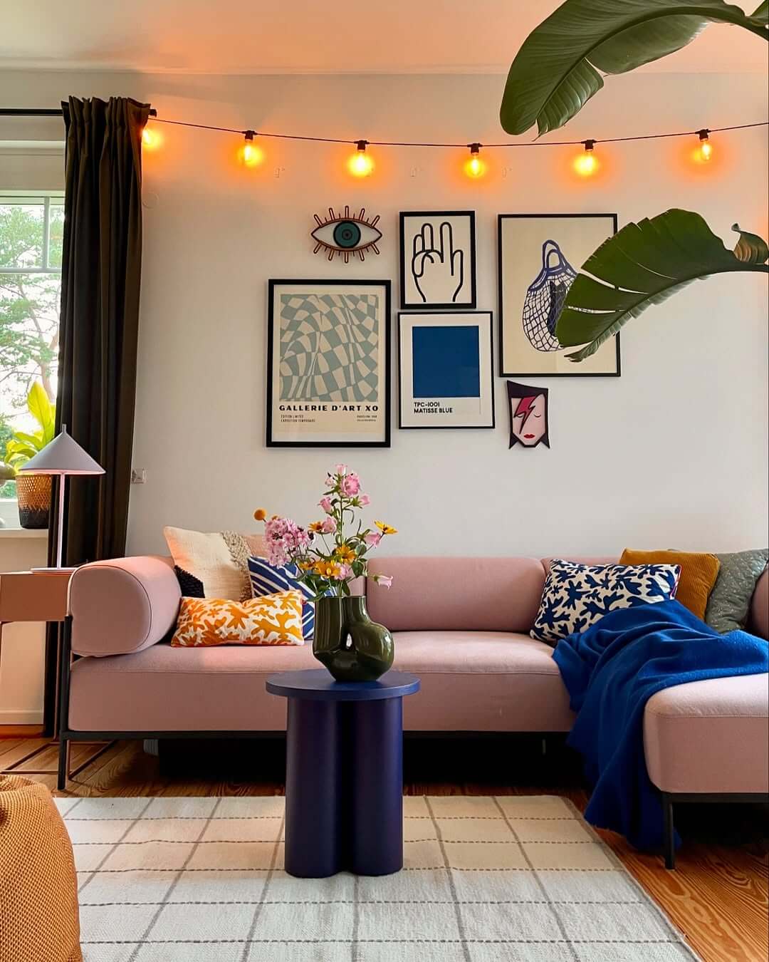 Eclectic Gallery Wall Mixes Art and Bold Shapes