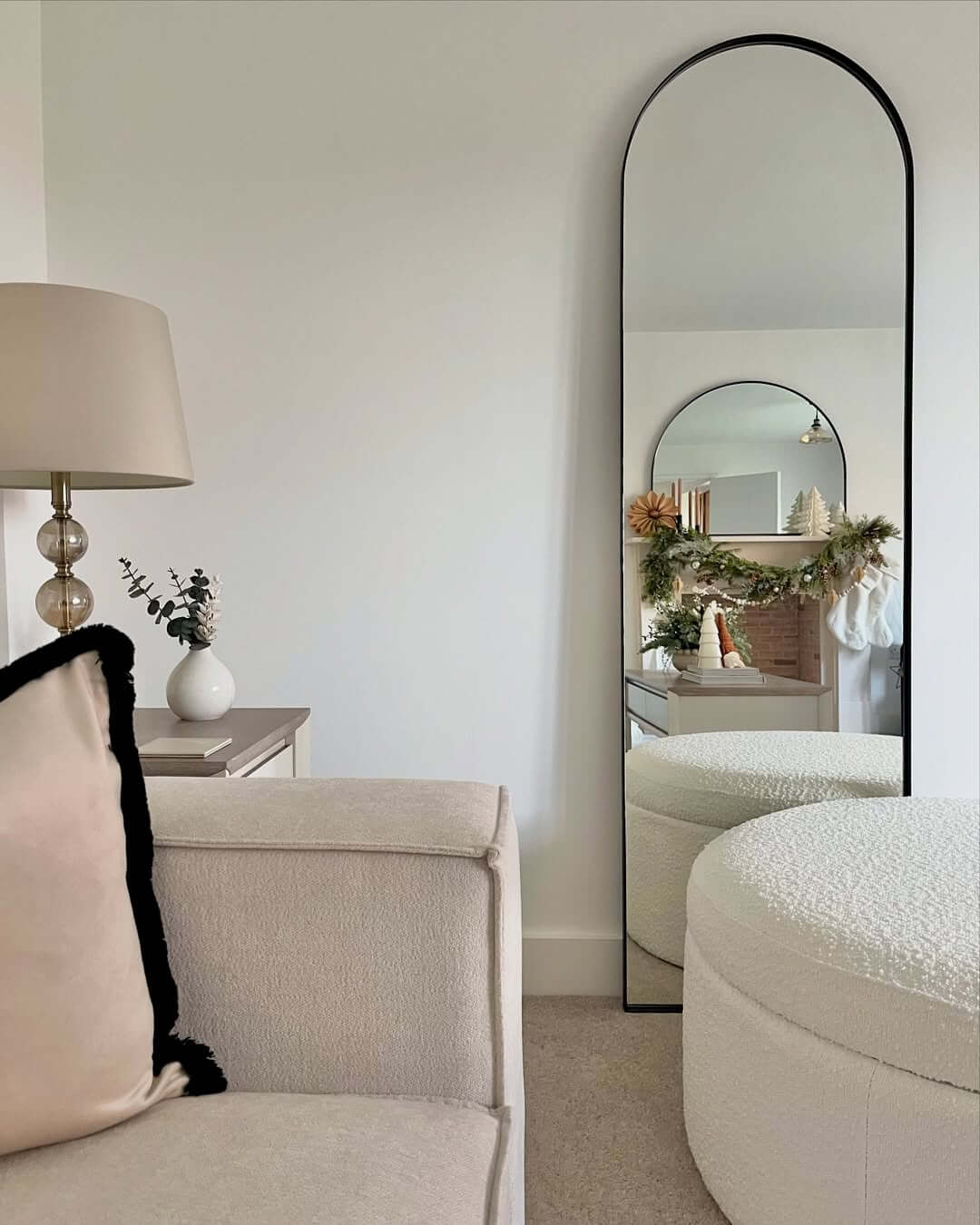 Reflect a Festive Mantel with a Tall Arched Mirror