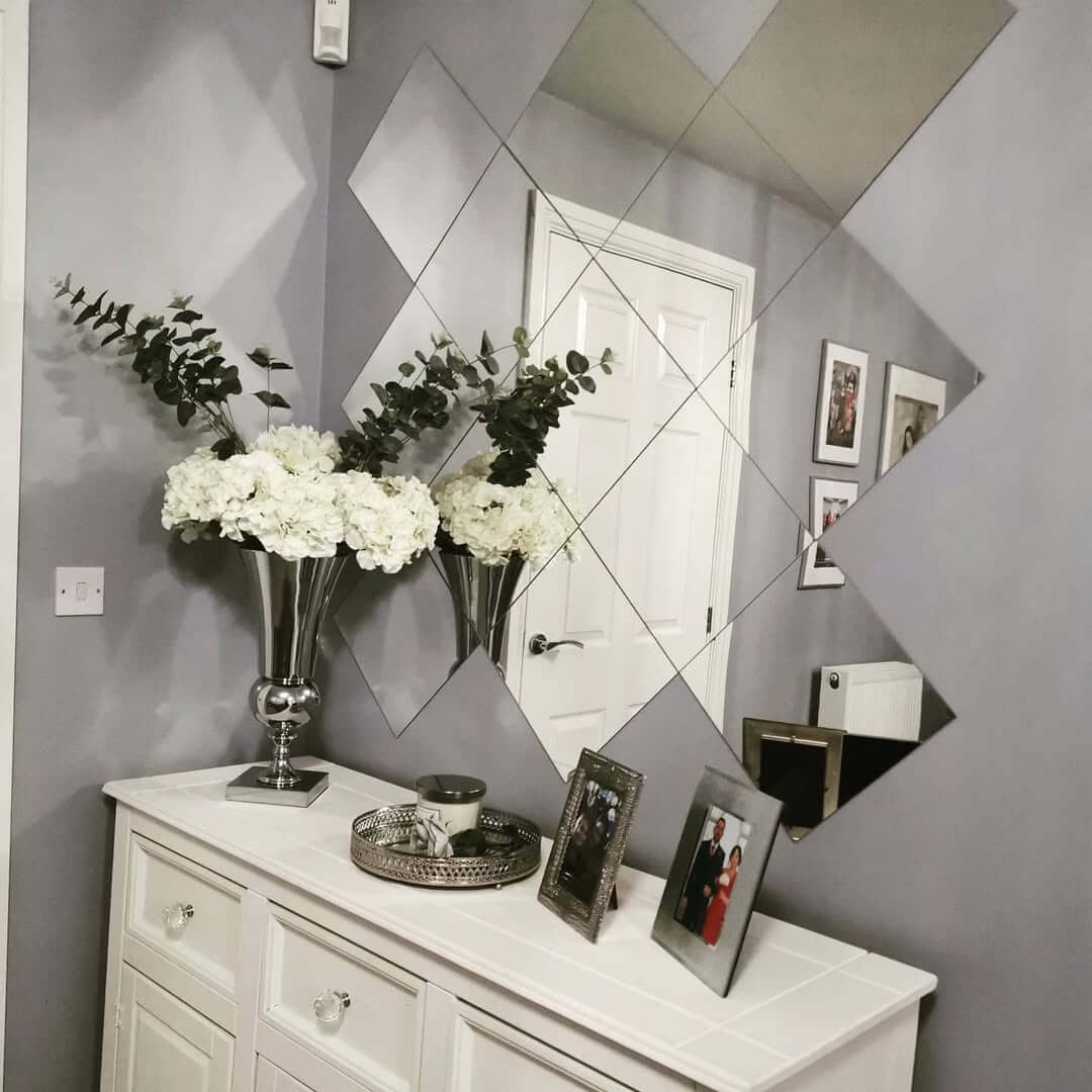 Diamond Mirror Tiles Create a Geometric Accent Wall