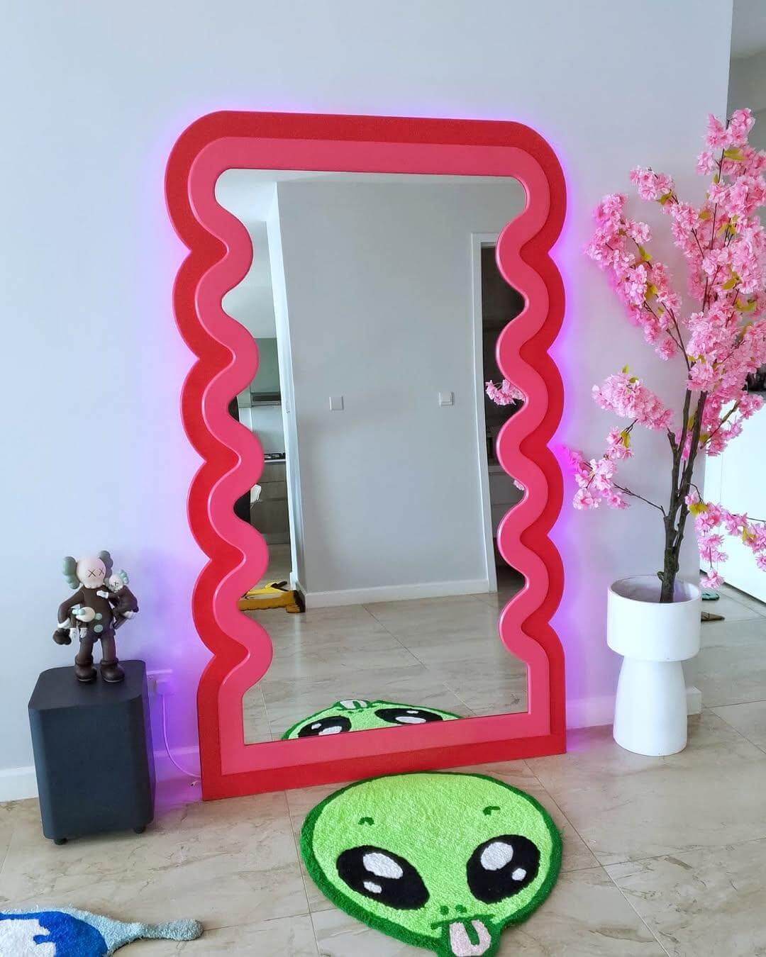 Wavy Pink Mirror with Integrated LED Lighting
