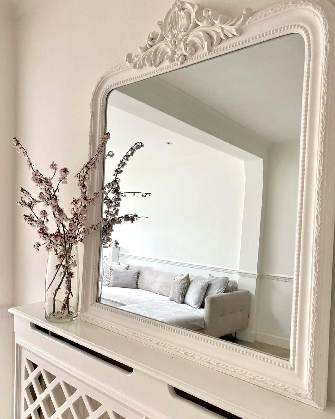 Frame a Bright Room with a White Ornate Mirror