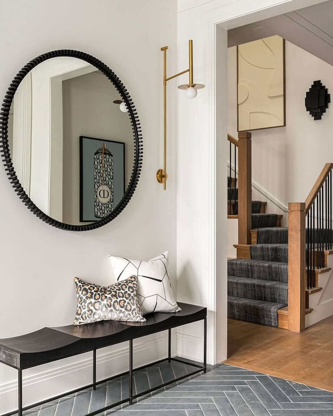 Round Mirror with Textured Black Frame Adds Graphic Punch