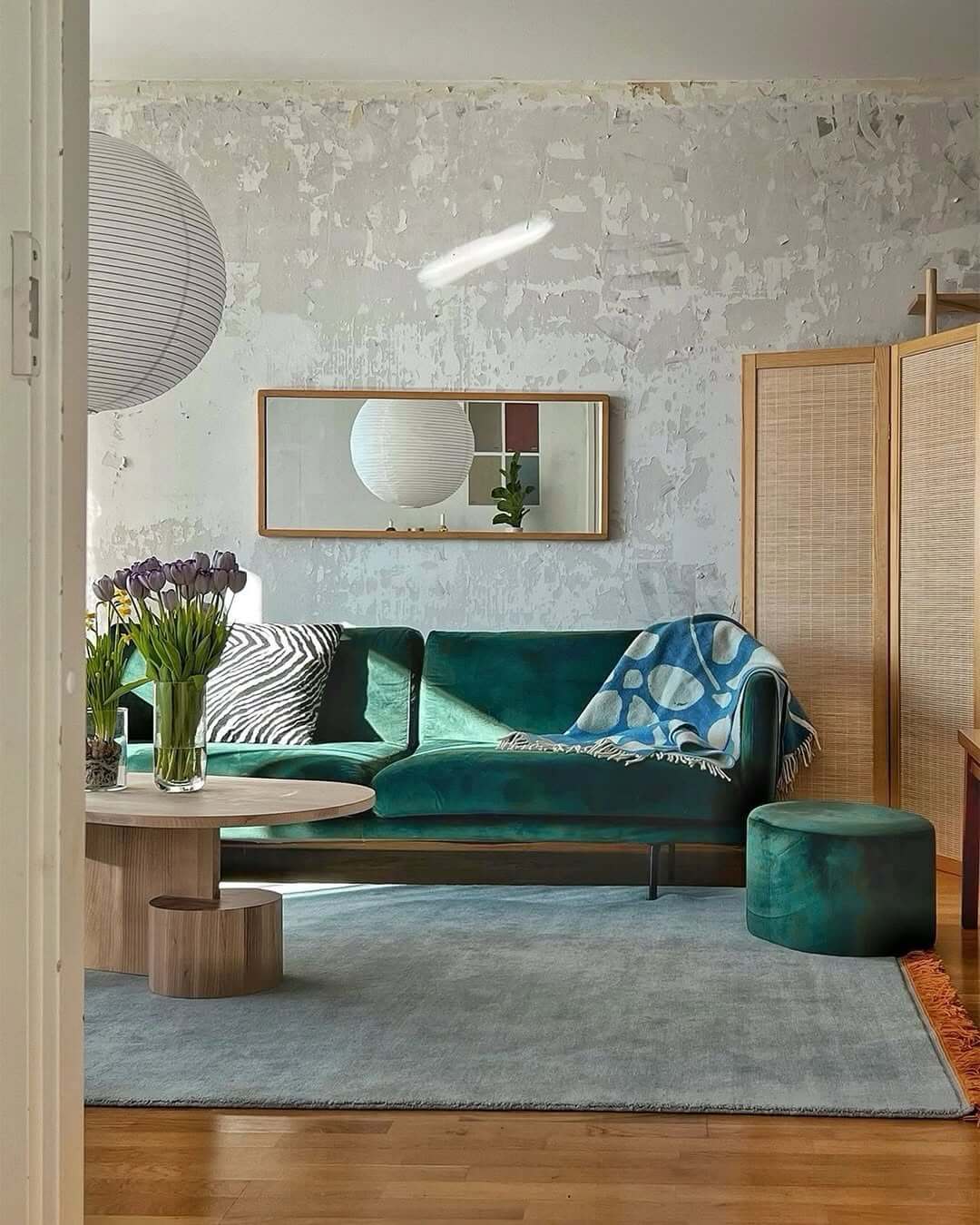 Soft Blue Rugs Create a Calm Foundation for Bold Furniture