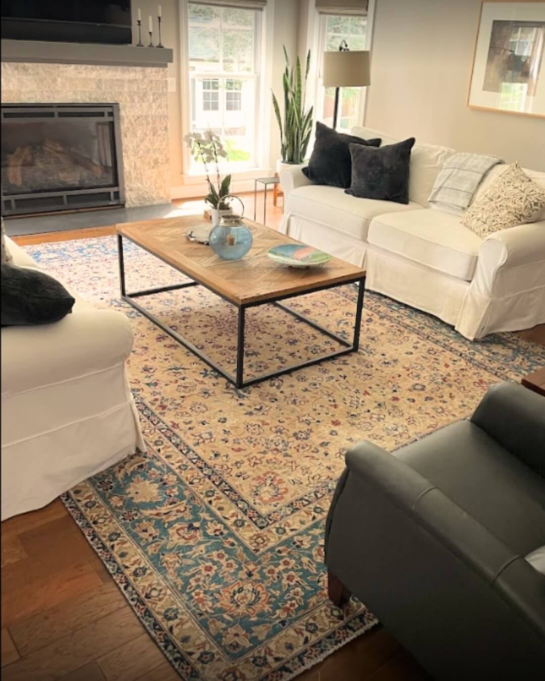 Layered Oriental Rugs Add Richness to Wood Floors