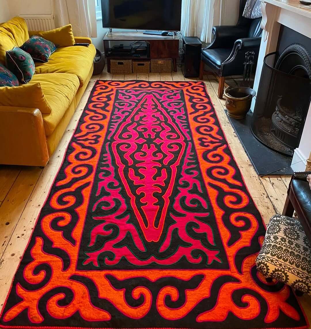 Bold Geometric Rugs Create a Vibrant Focal Point