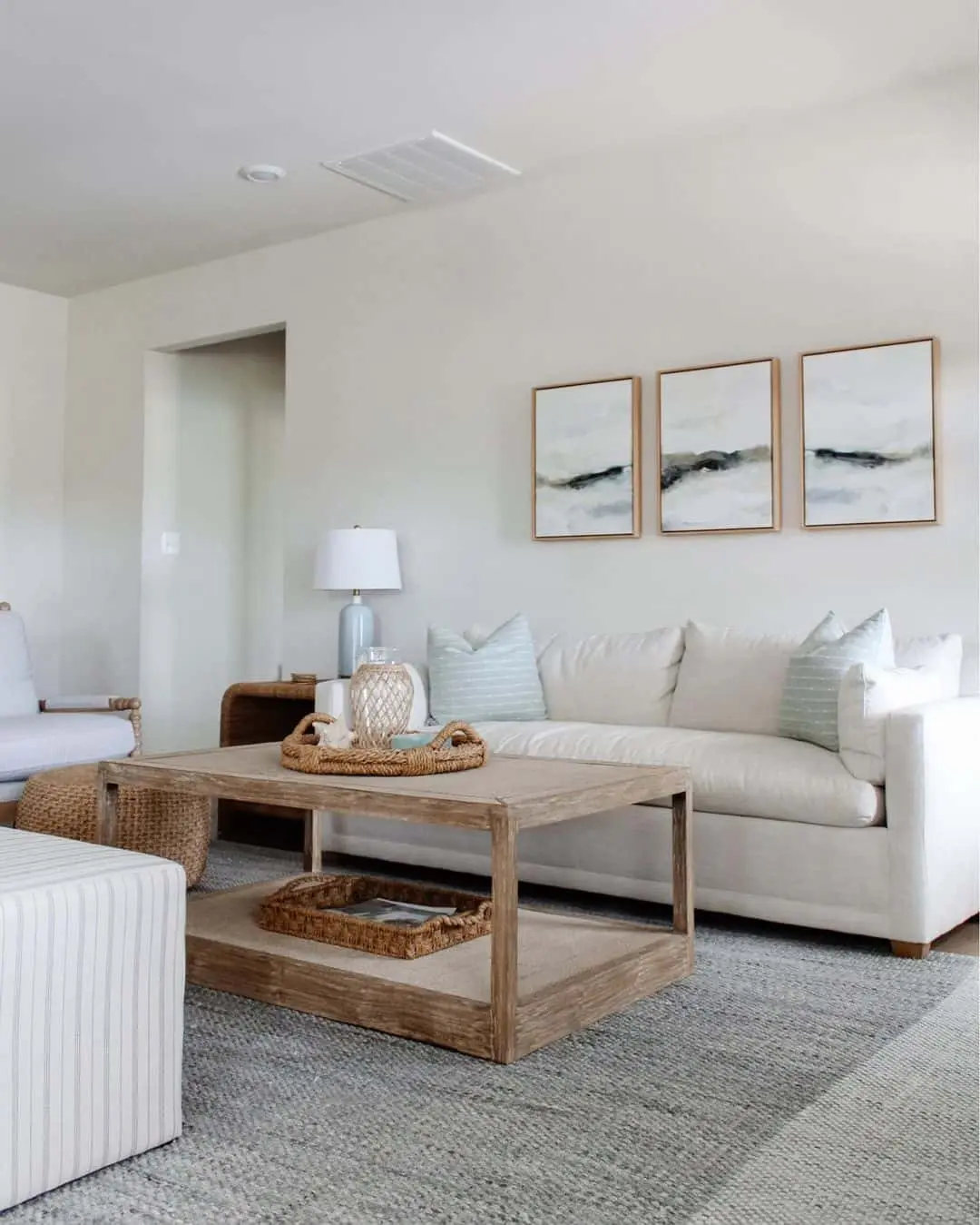 Three Abstract Landscapes Above Sofa