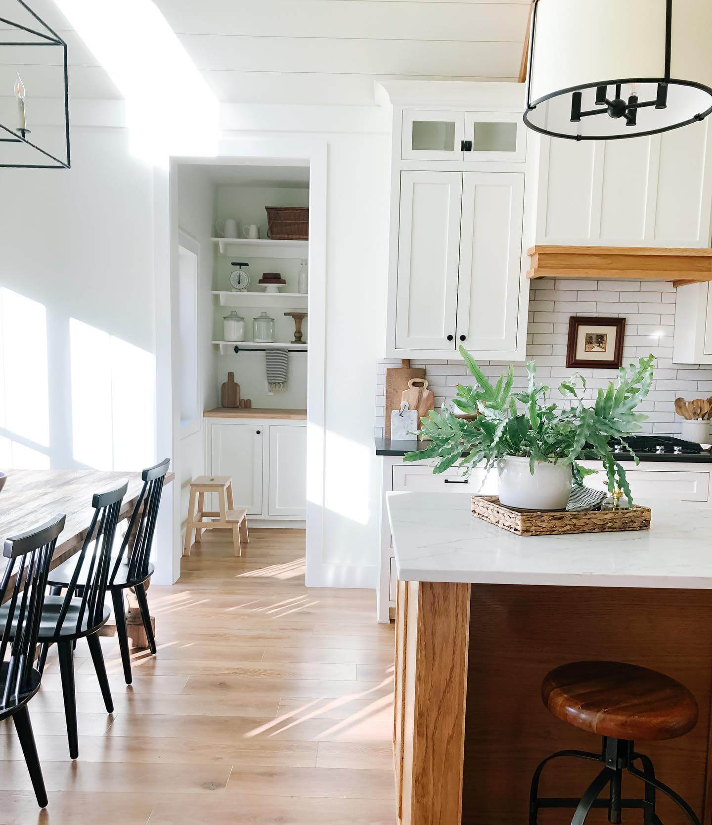 Open Pantry Shelves With Vintage Scale and Jars