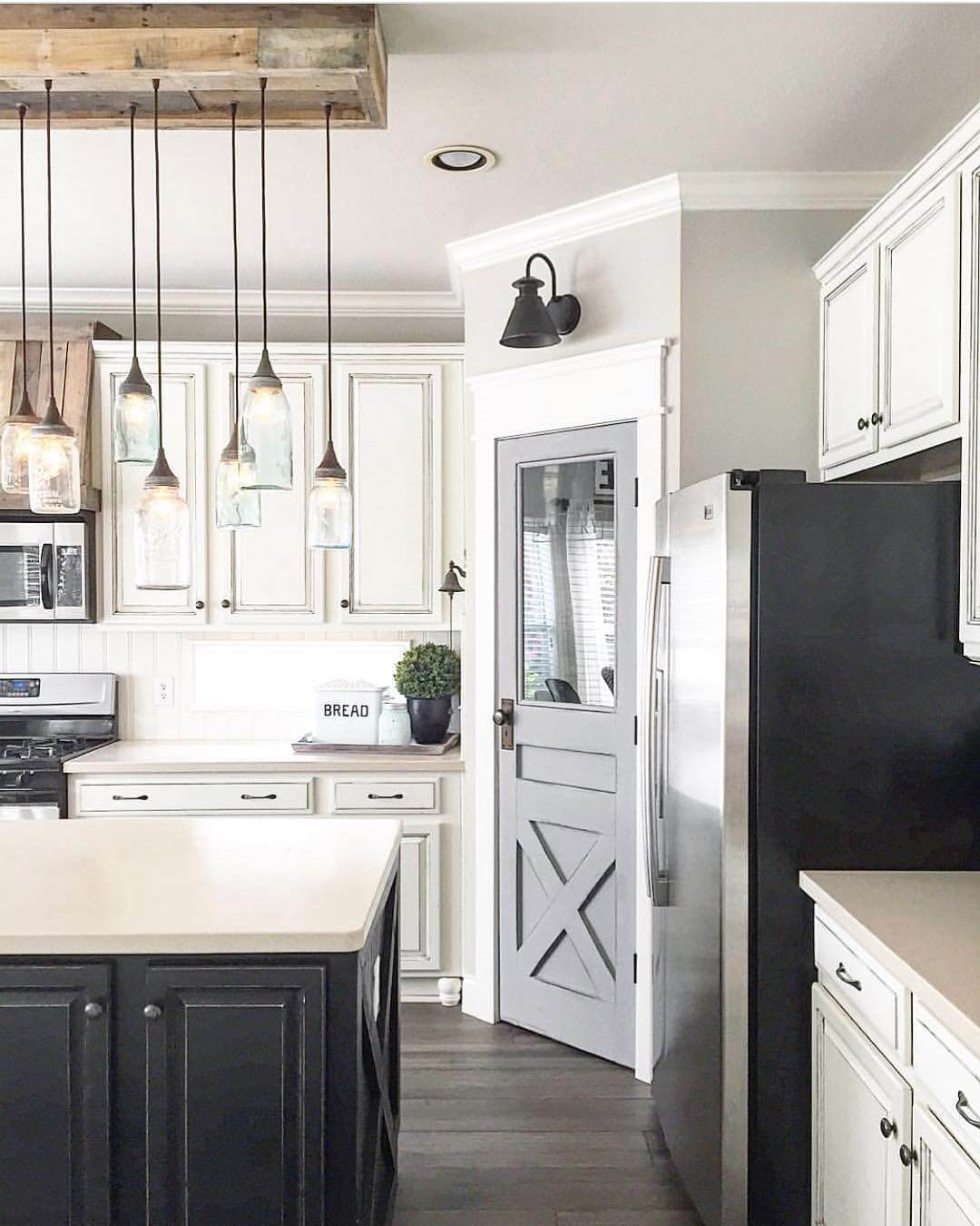 Gray Barn Door With X-Panel Detailing Welcomes Guests