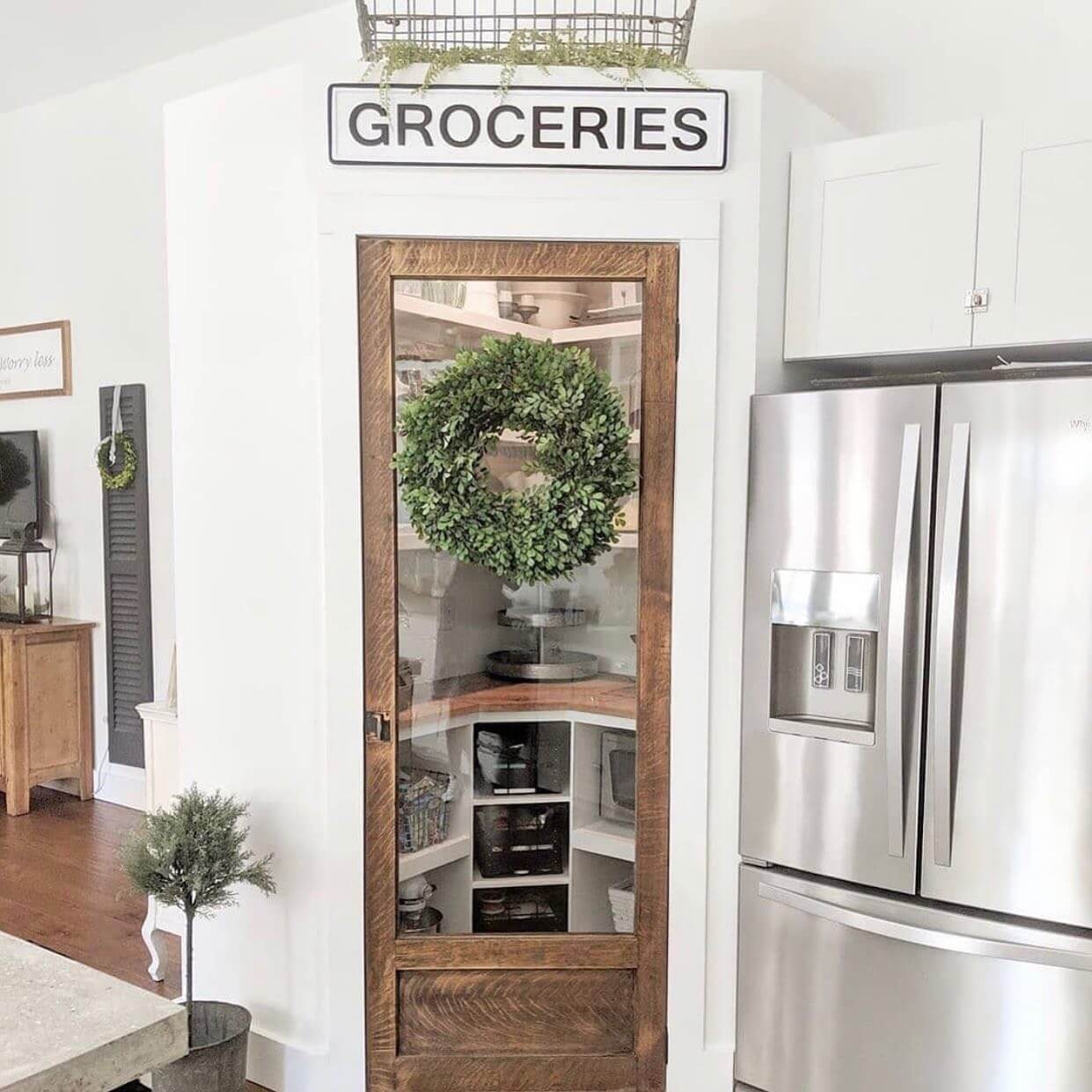 Glass Pantry Door With A Boxwood Wreath Accent