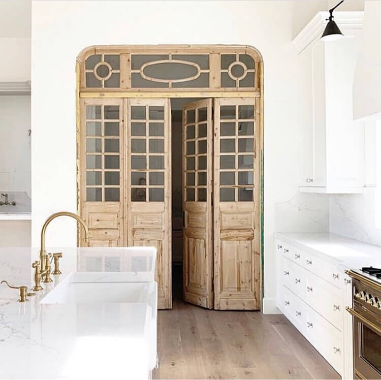 Antique French Doors Frame a Light-Filled Pantry