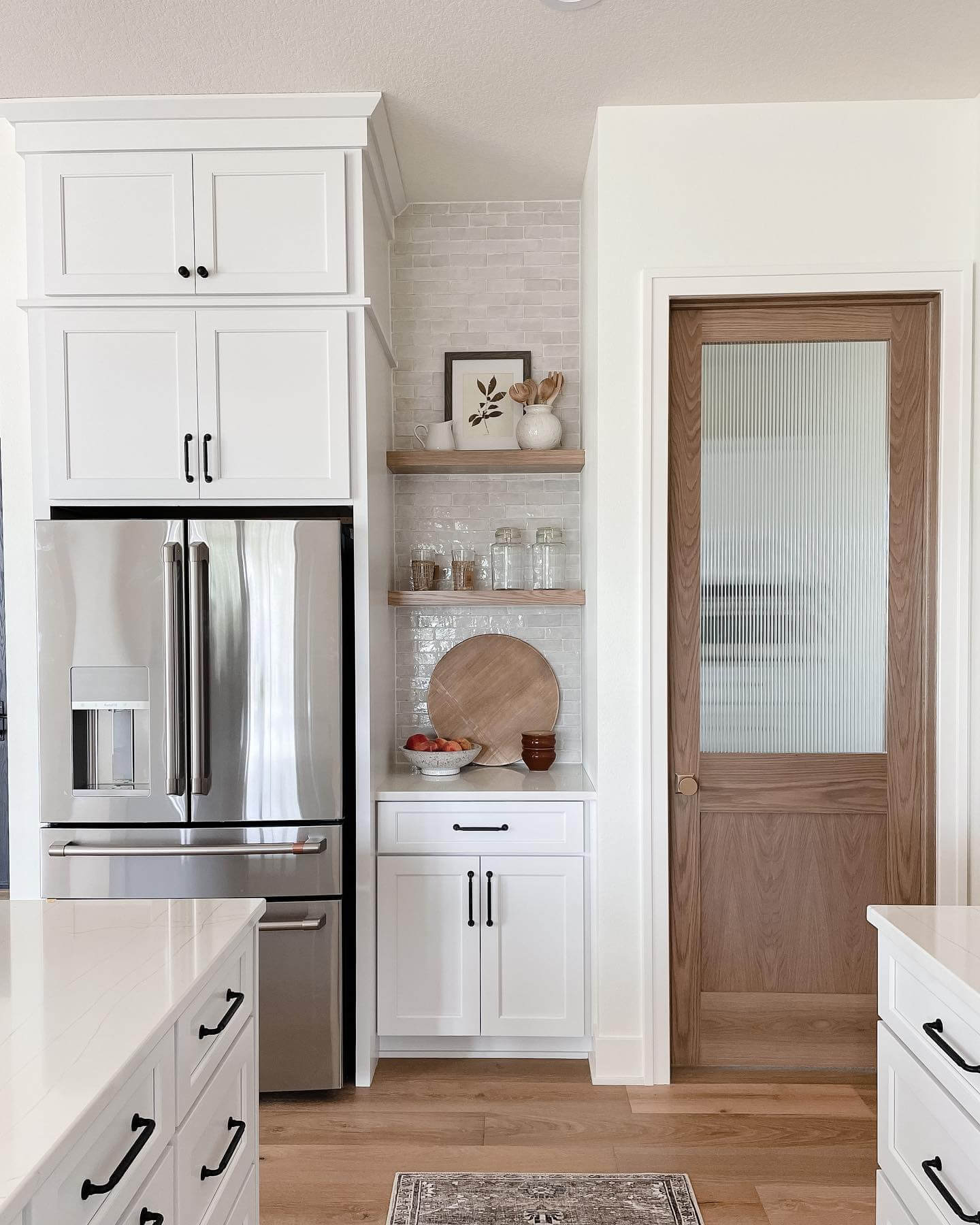 Fluted Glass Pantry Door Adds Warmth With Natural Wood