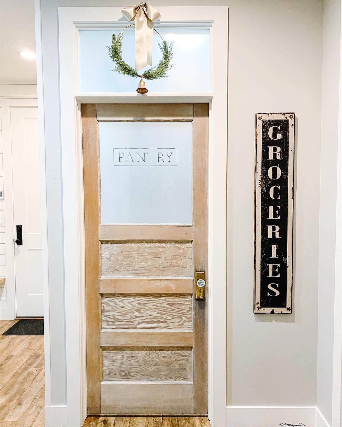 Frosted Glass Pantry Door With Whitewashed Wood Panels