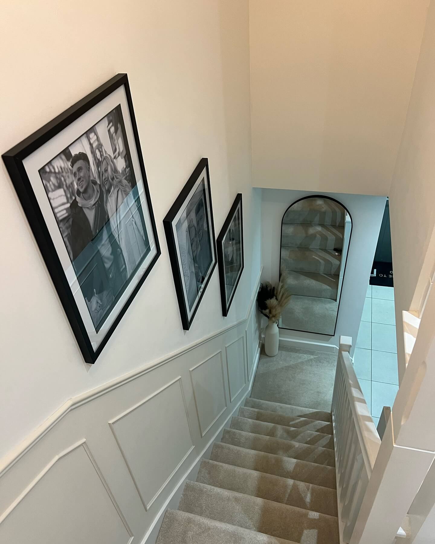 Personalize Your Staircase with Black and White Portraits