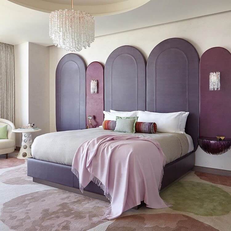 Arched Panels Mimic an Architectural Headboard Wall