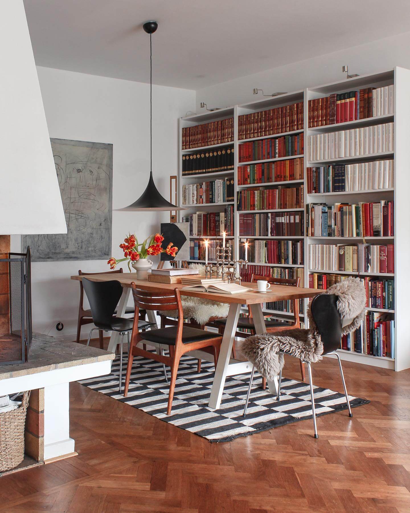 Wall of Bookshelves Creates a Cozy, Immersive Reading Environment