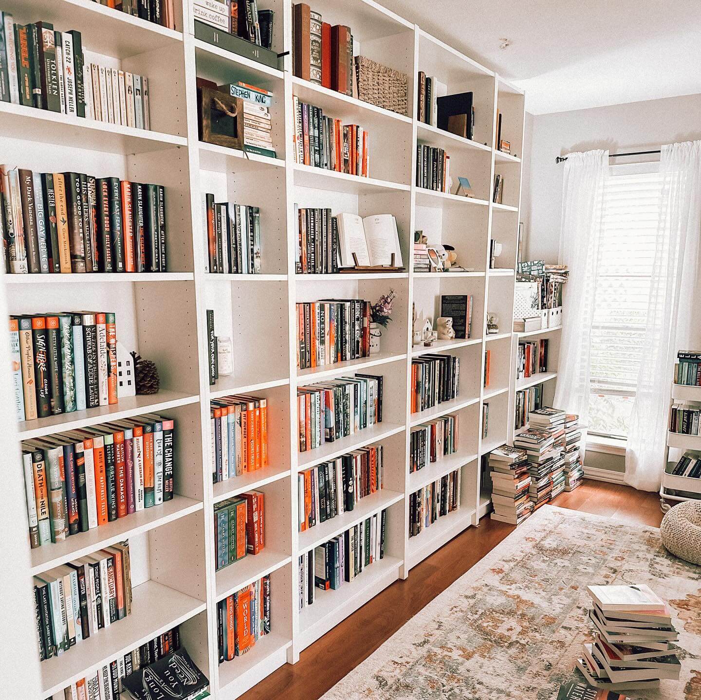 Bright White Built-Ins for an Expansive Library Wall