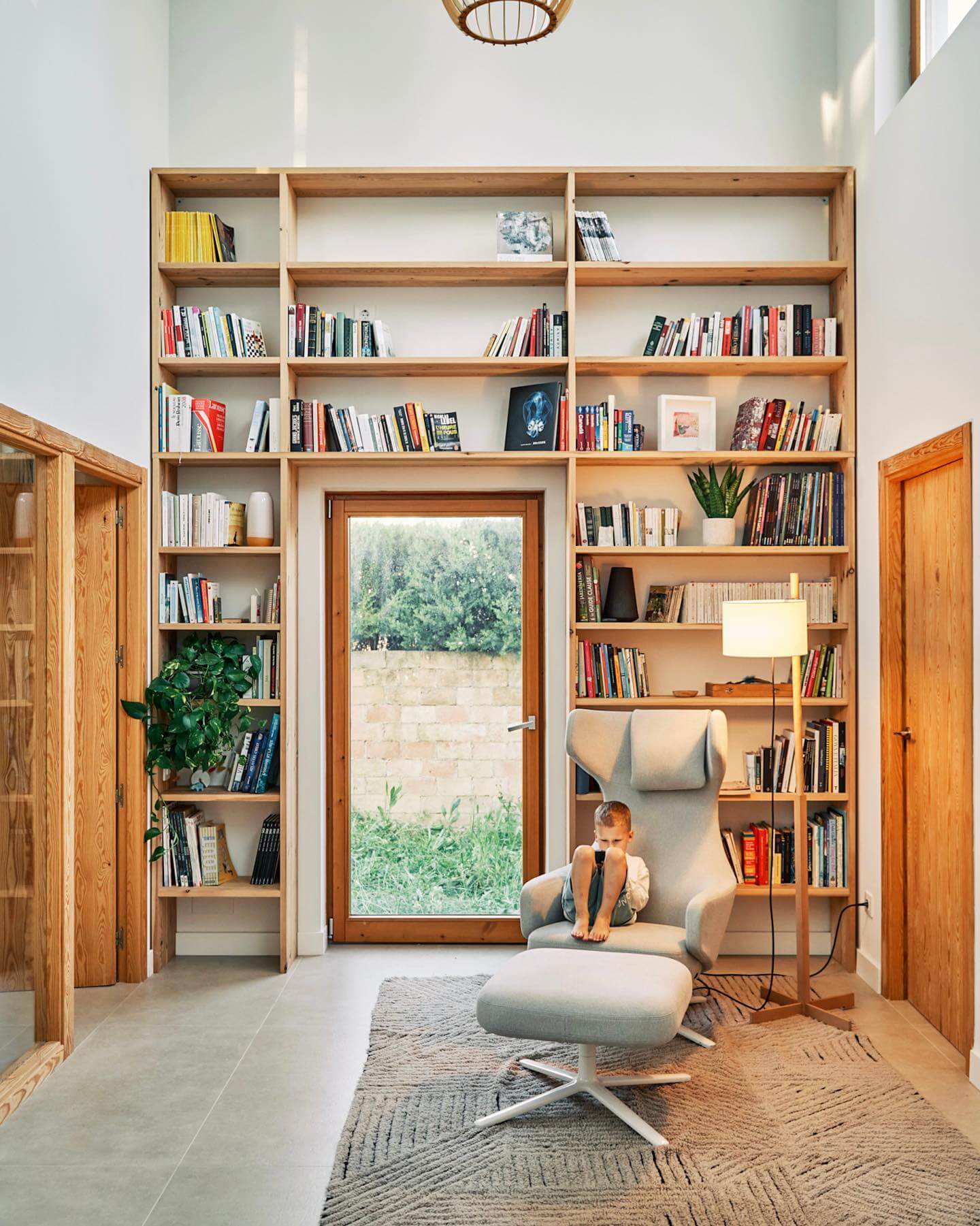 Floor-to-Ceiling Shelves Define Your Reading Nook