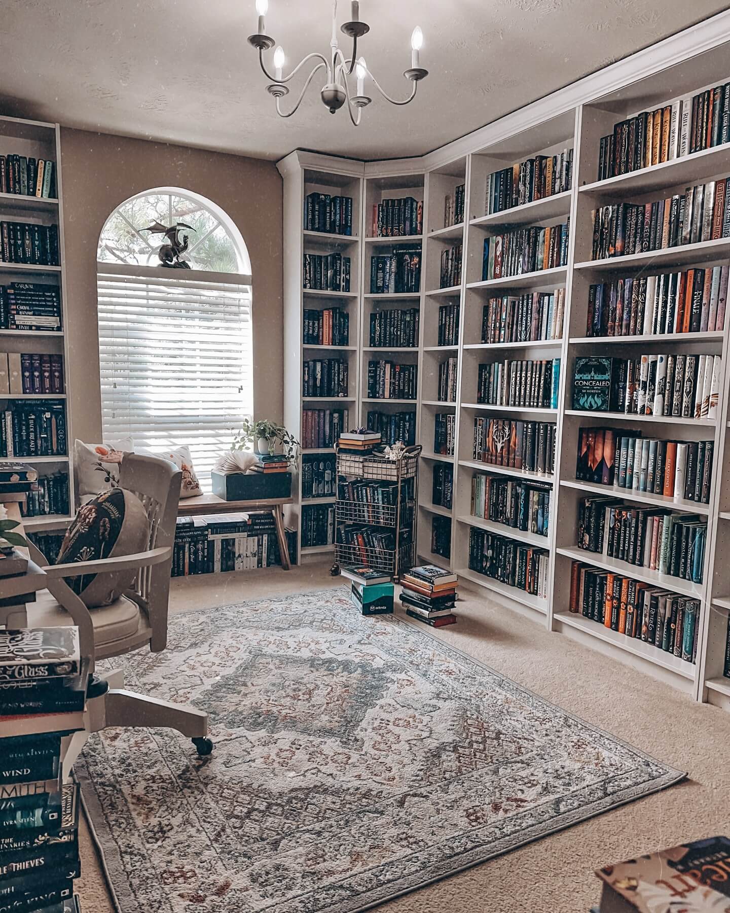 Arched Window as a Focal Point for Bookshelves