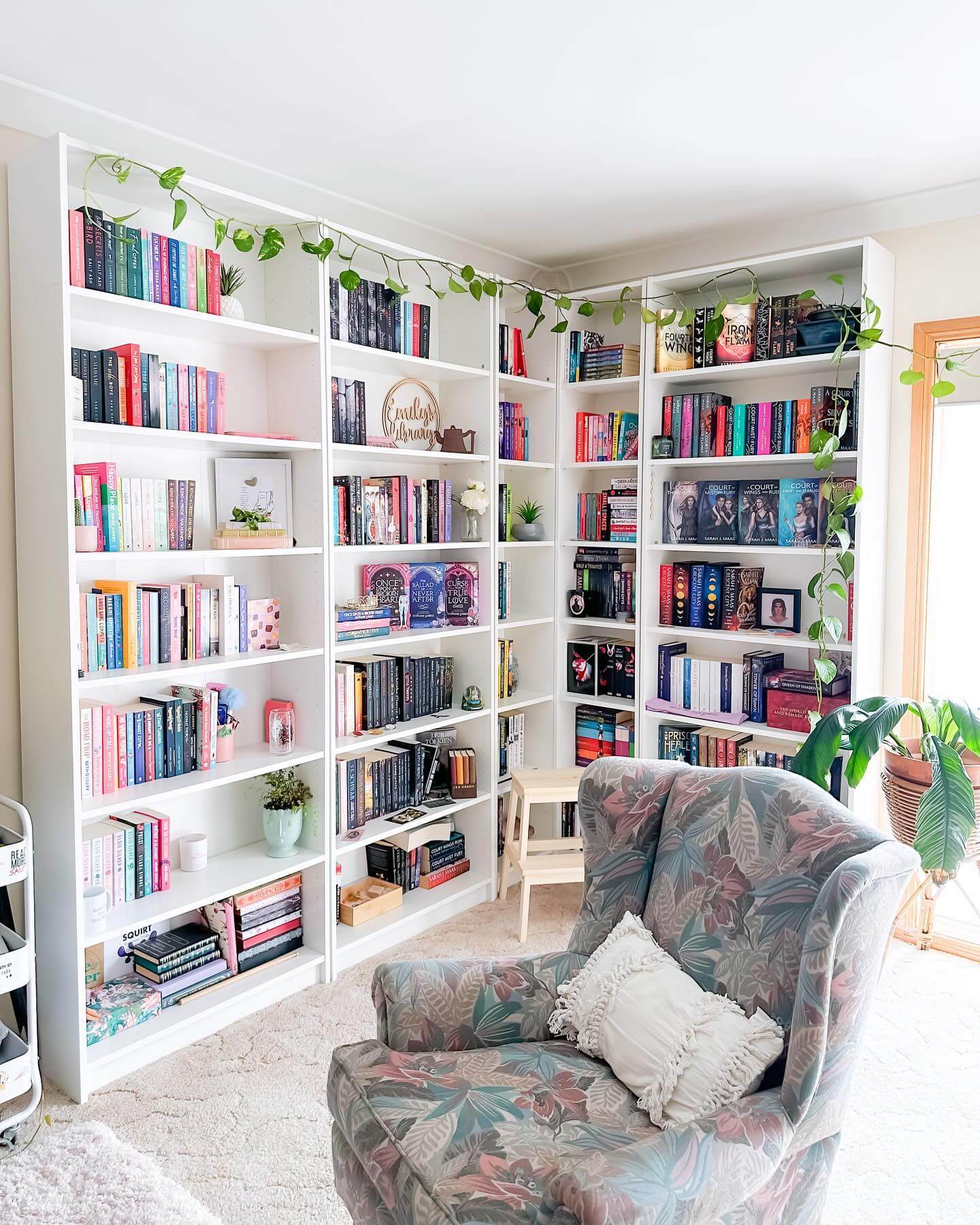 Trailing Greenery Softens White Bookshelves