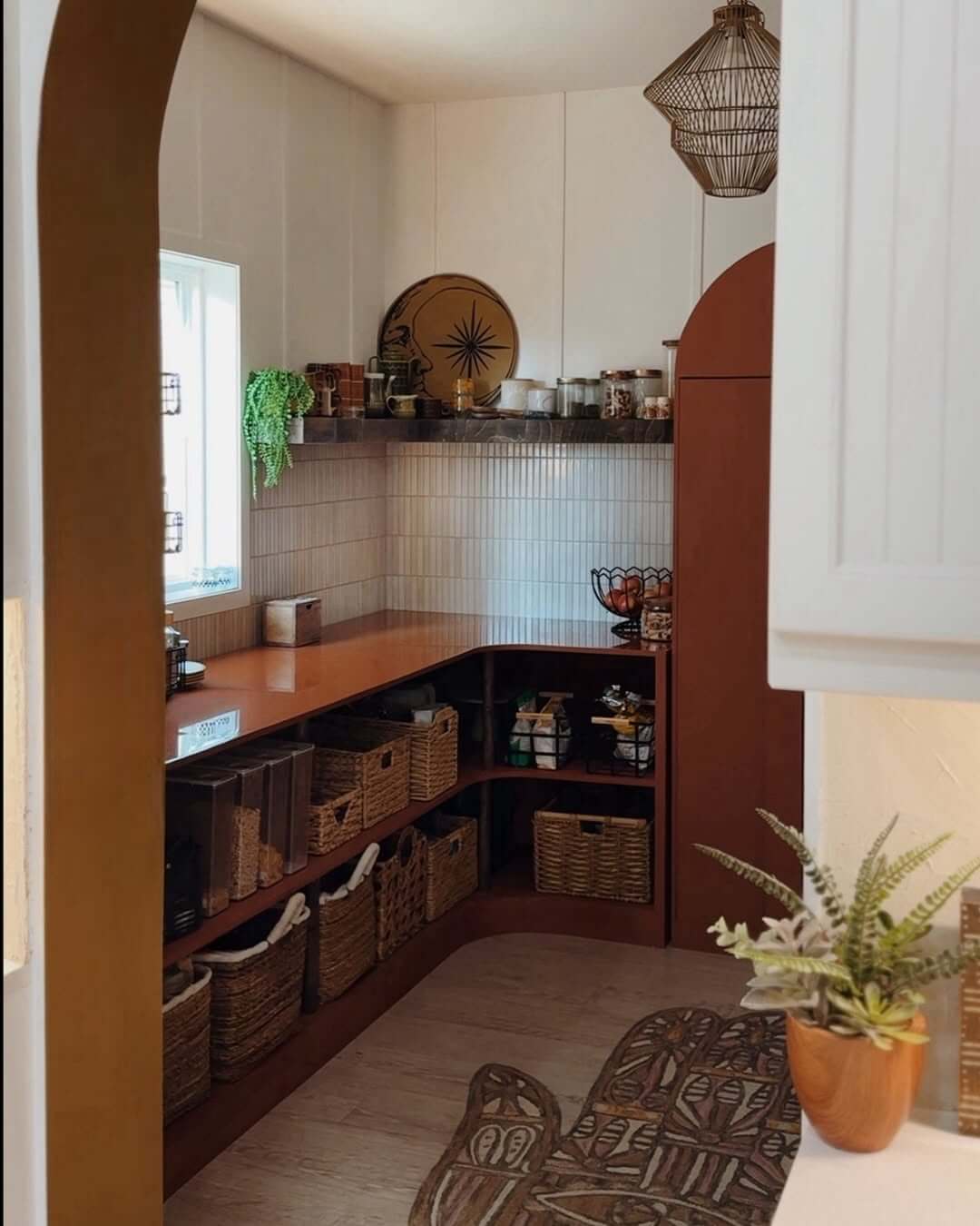 Woven Baskets Create Cozy, Accessible Pantry Cubbies
