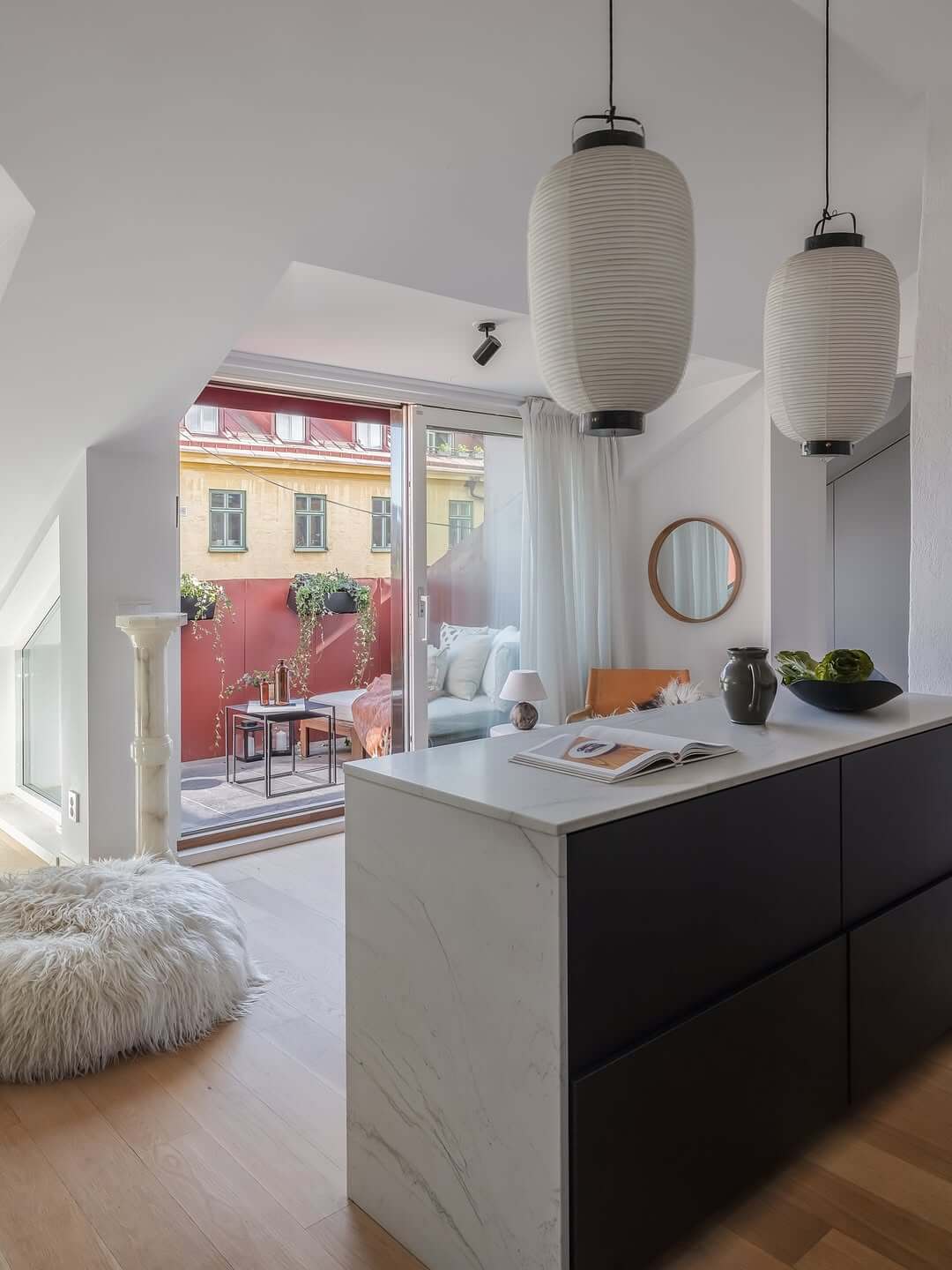 Illuminate Your Kitchen Island with Paper Lantern Pendants