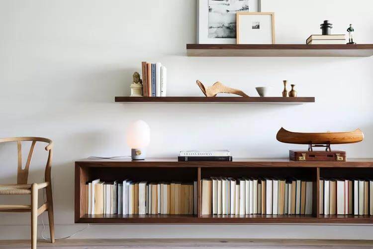 Floating Media Console With Books and Decorative Objects