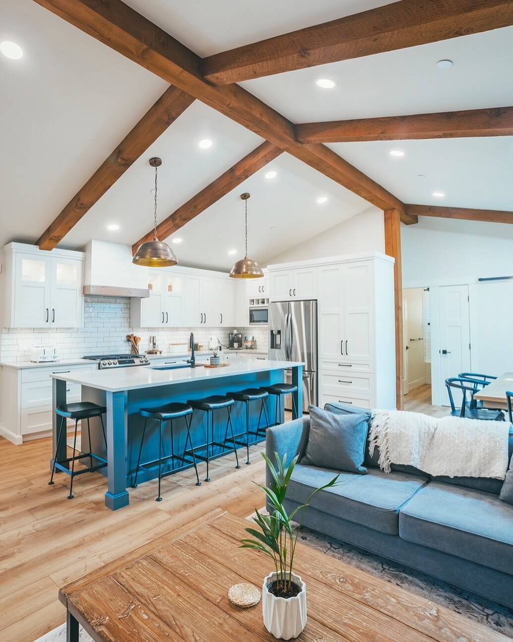 Bold Blue Island with Contrasting Black Stools