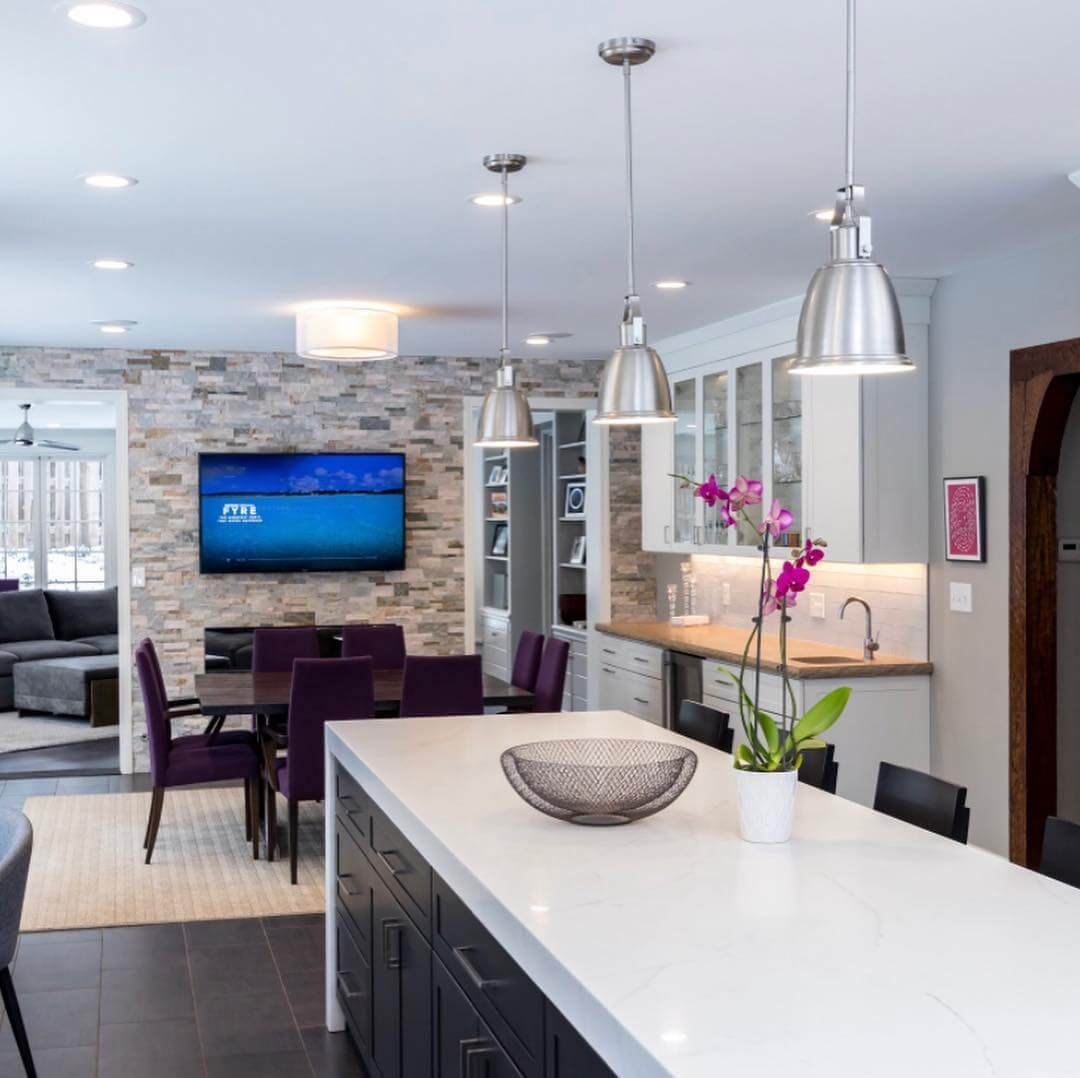 Design a Cozy Dining Nook with a Stone Accent Wall and TV