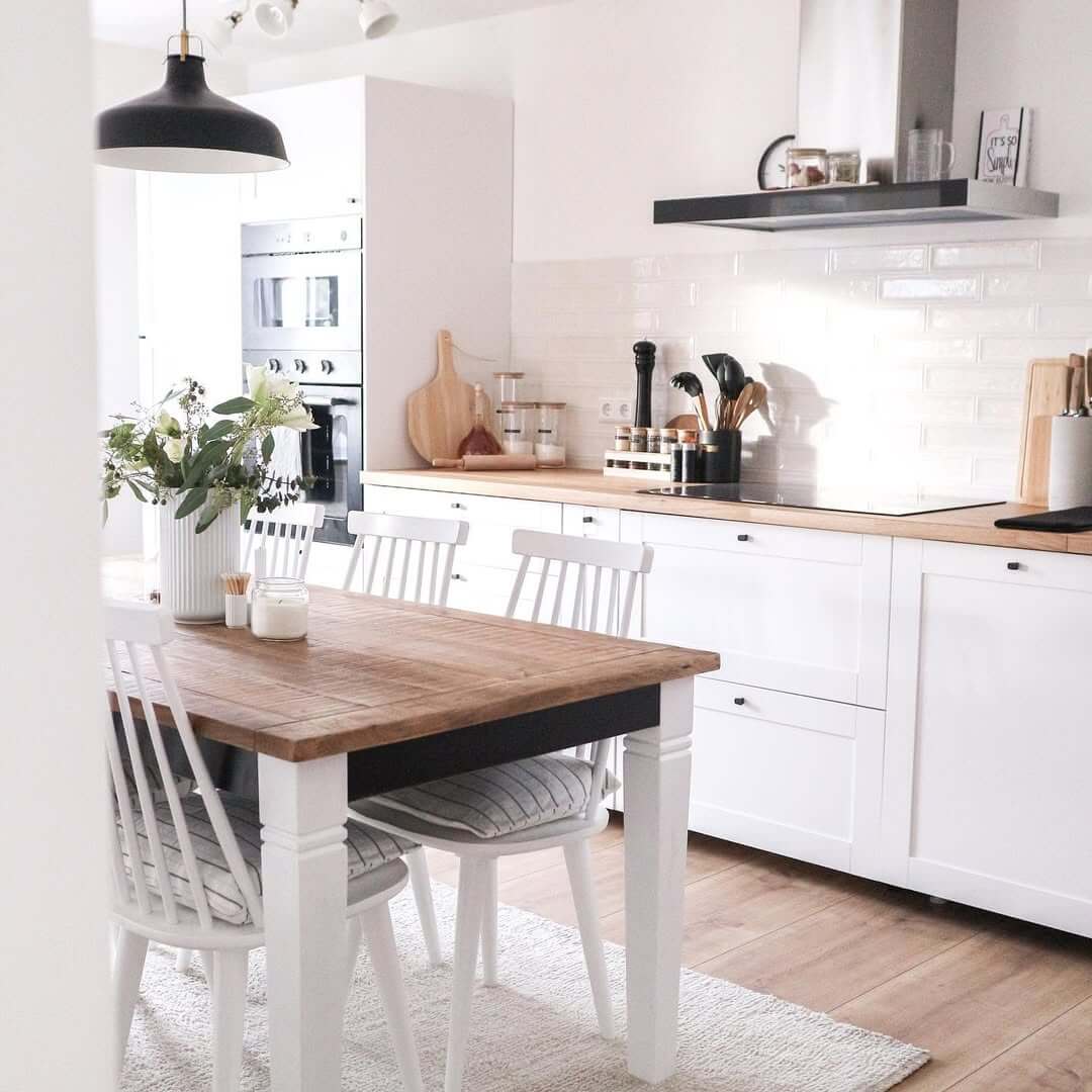 Embrace Farmhouse Charm with a Wood Table and Spindle Chairs