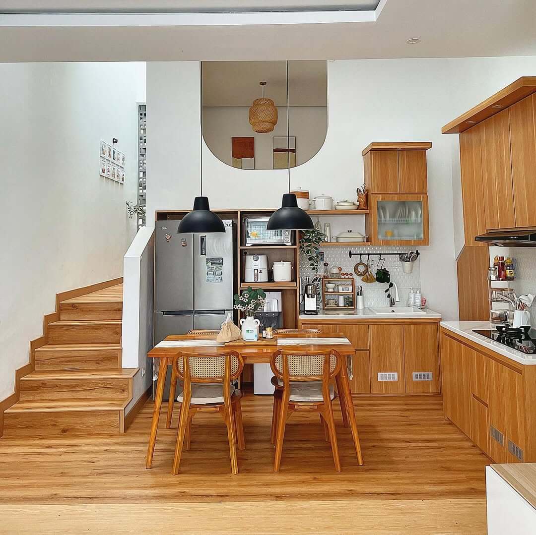 Open Archway Reflects Pendant Lights and Art