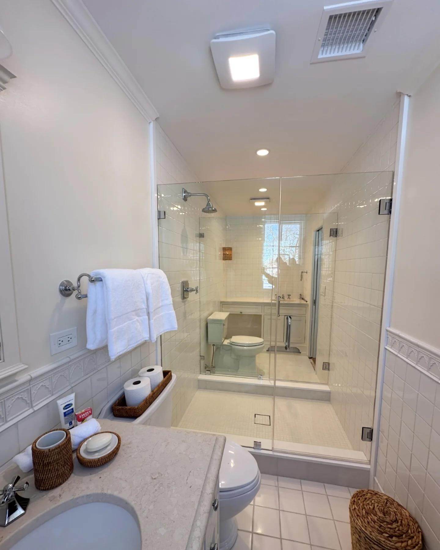 Glass Shower Enclosure Creates an Open, Airy Feel