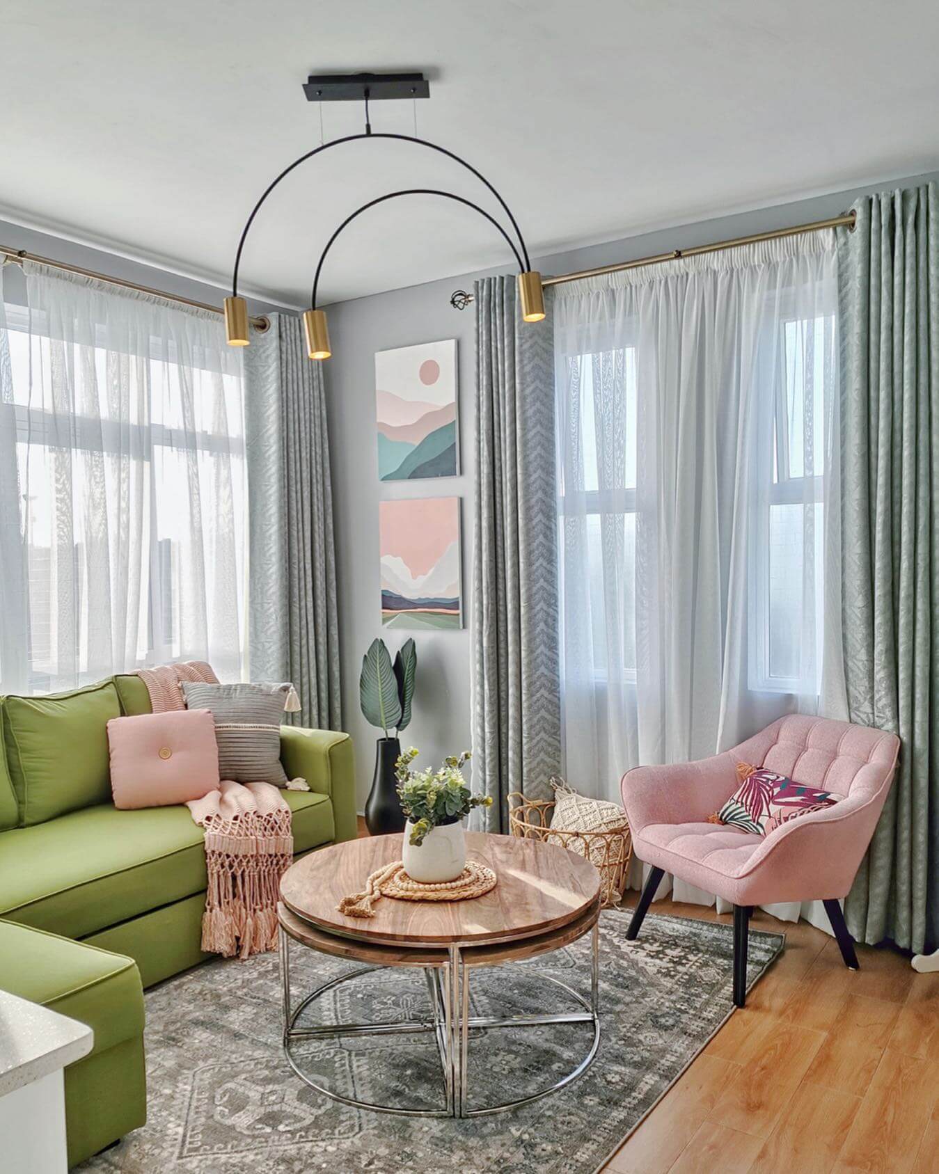 Arched pendant light adds sculptural interest overhead