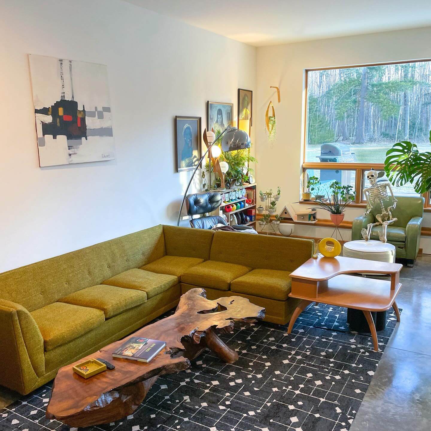 Anchor your space with a live-edge coffee table on a graphic rug