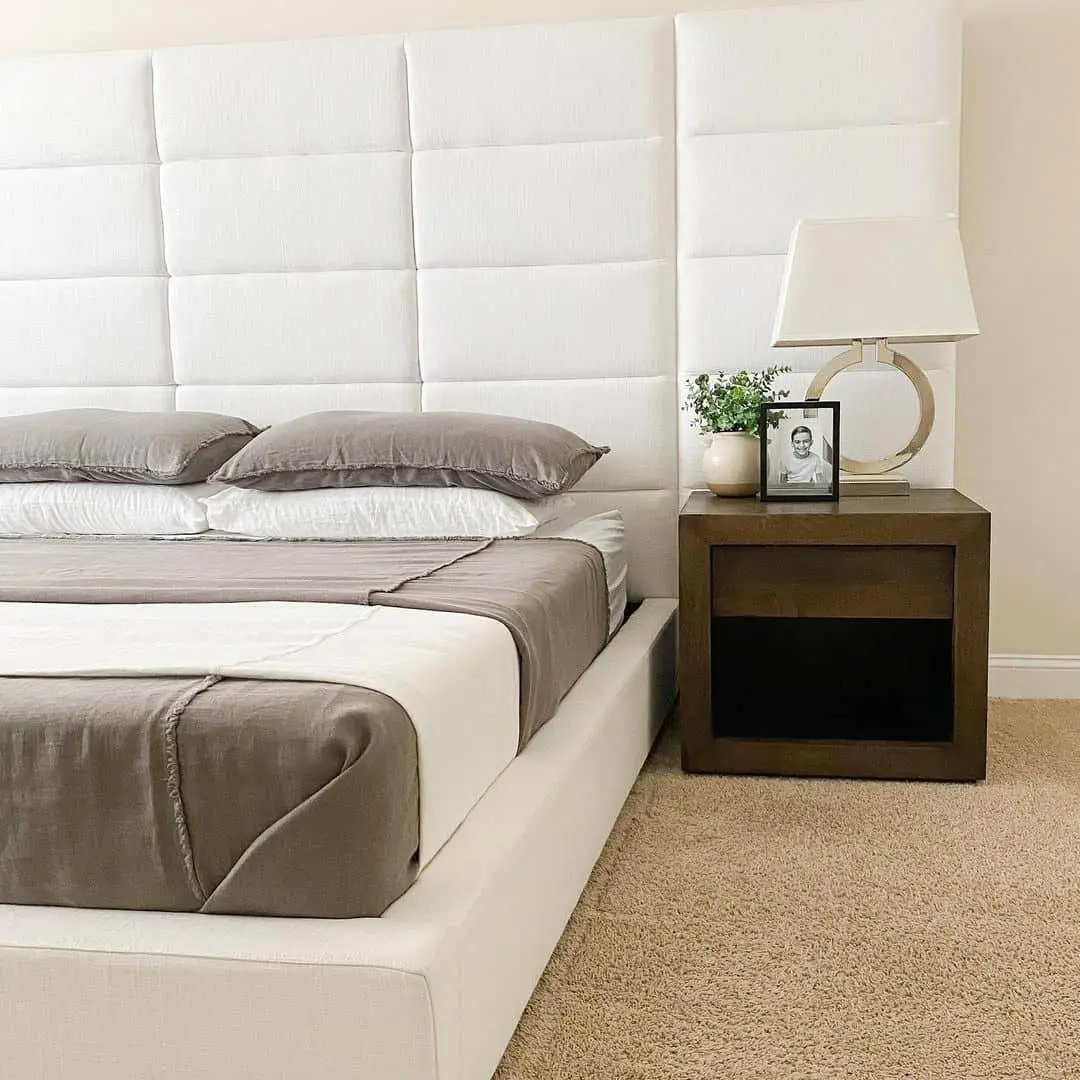 Quilted Headboard Adds Soft Paneling Above the Bed