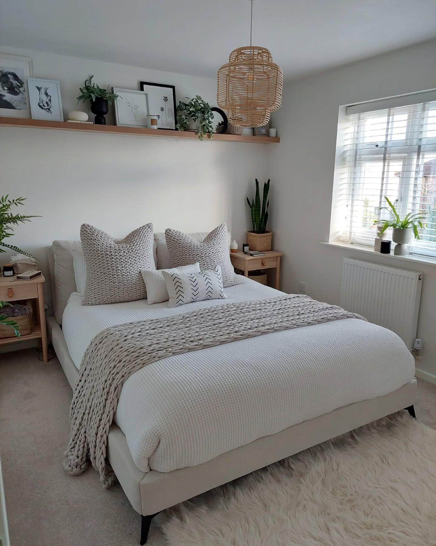 Personalize Your Wall with Art, Plants, and Objects on Light Wood