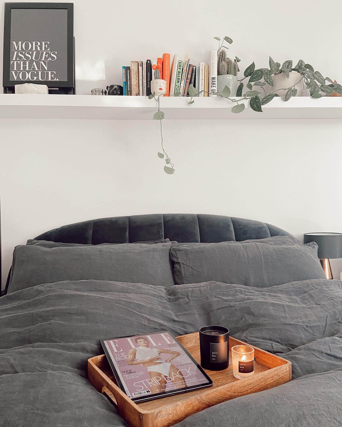 Juxtapose Graphic Art and Cascading Greenery on a White Shelf