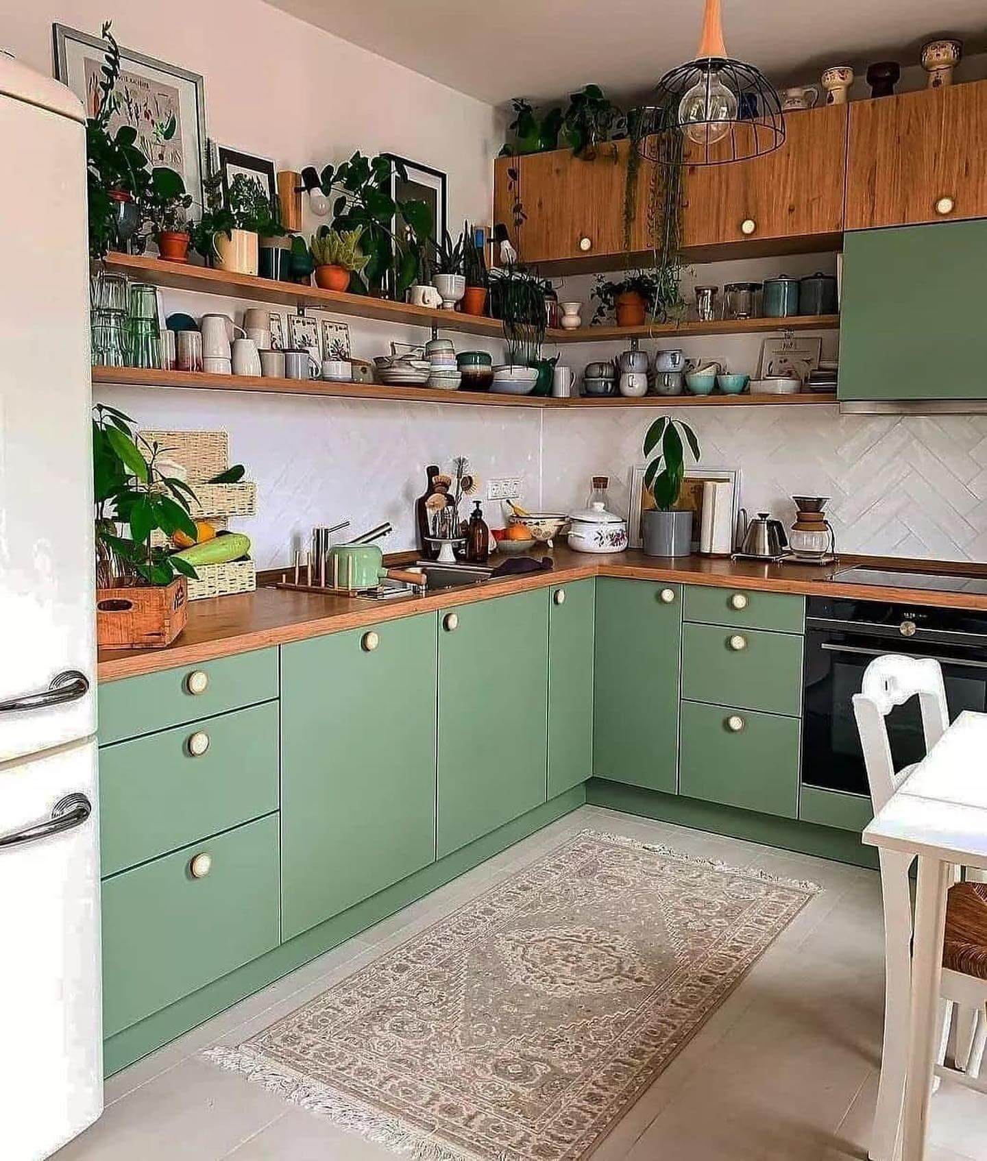 Soothing Sage Green Cabinets with Warm Wood Accents