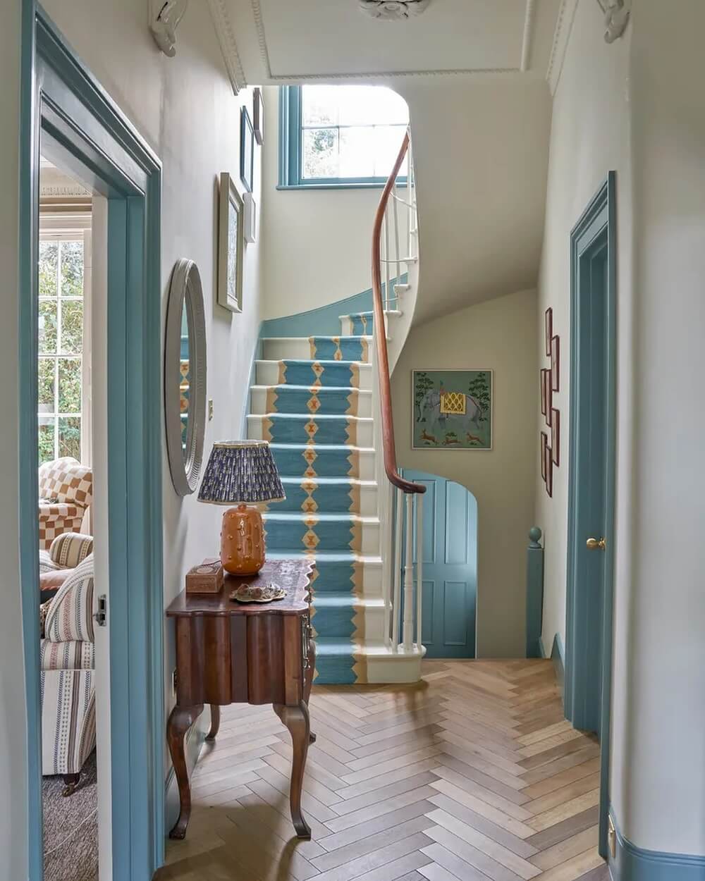 Blue and yellow stair runner adds a graphic pop of color