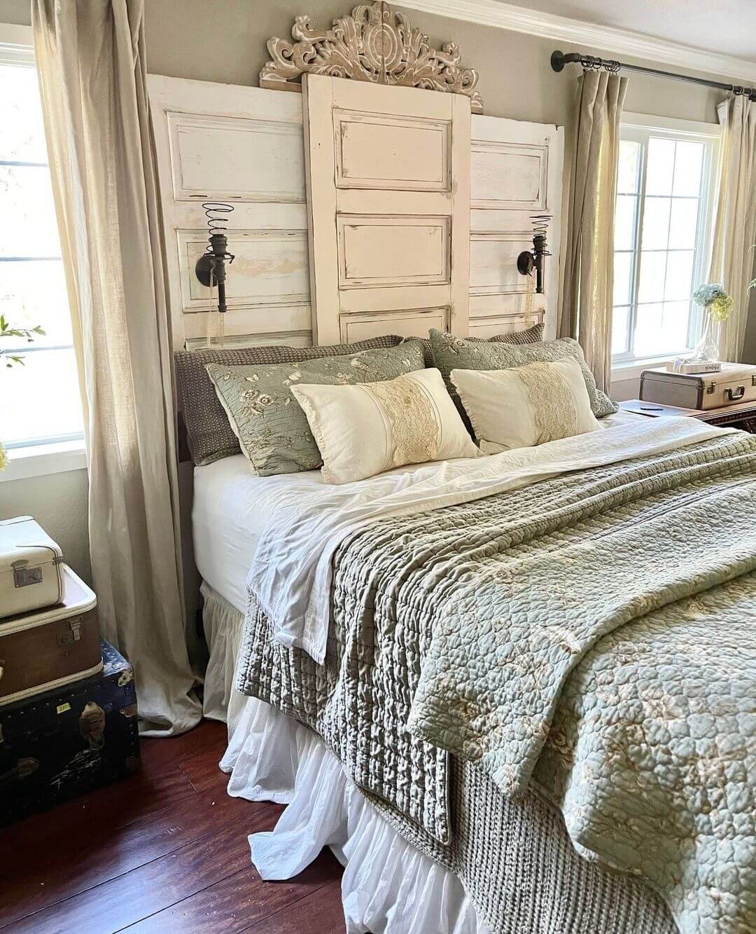 Salvaged Doors Form a Layered Farmhouse Headboard