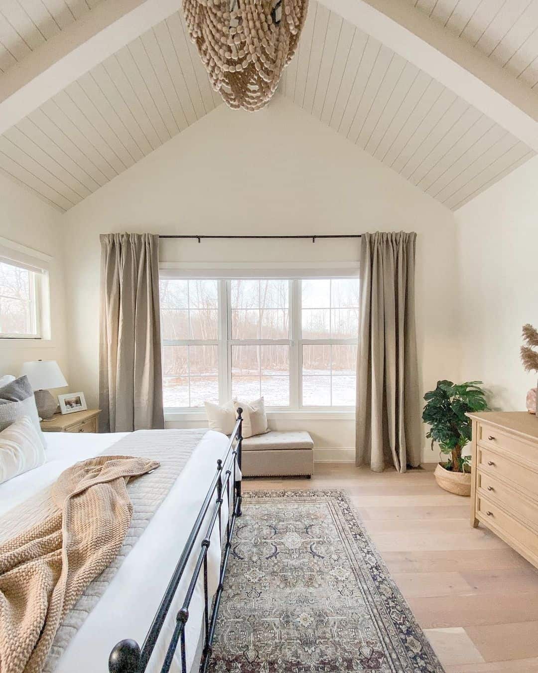 Beaded Chandelier Adds Organic Texture to Vaulted Ceiling