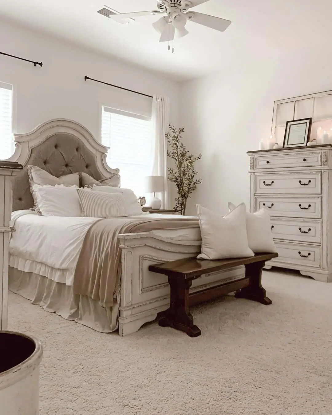 Distressed White Dresser Adds Vintage Charm and Candlelit Ambiance