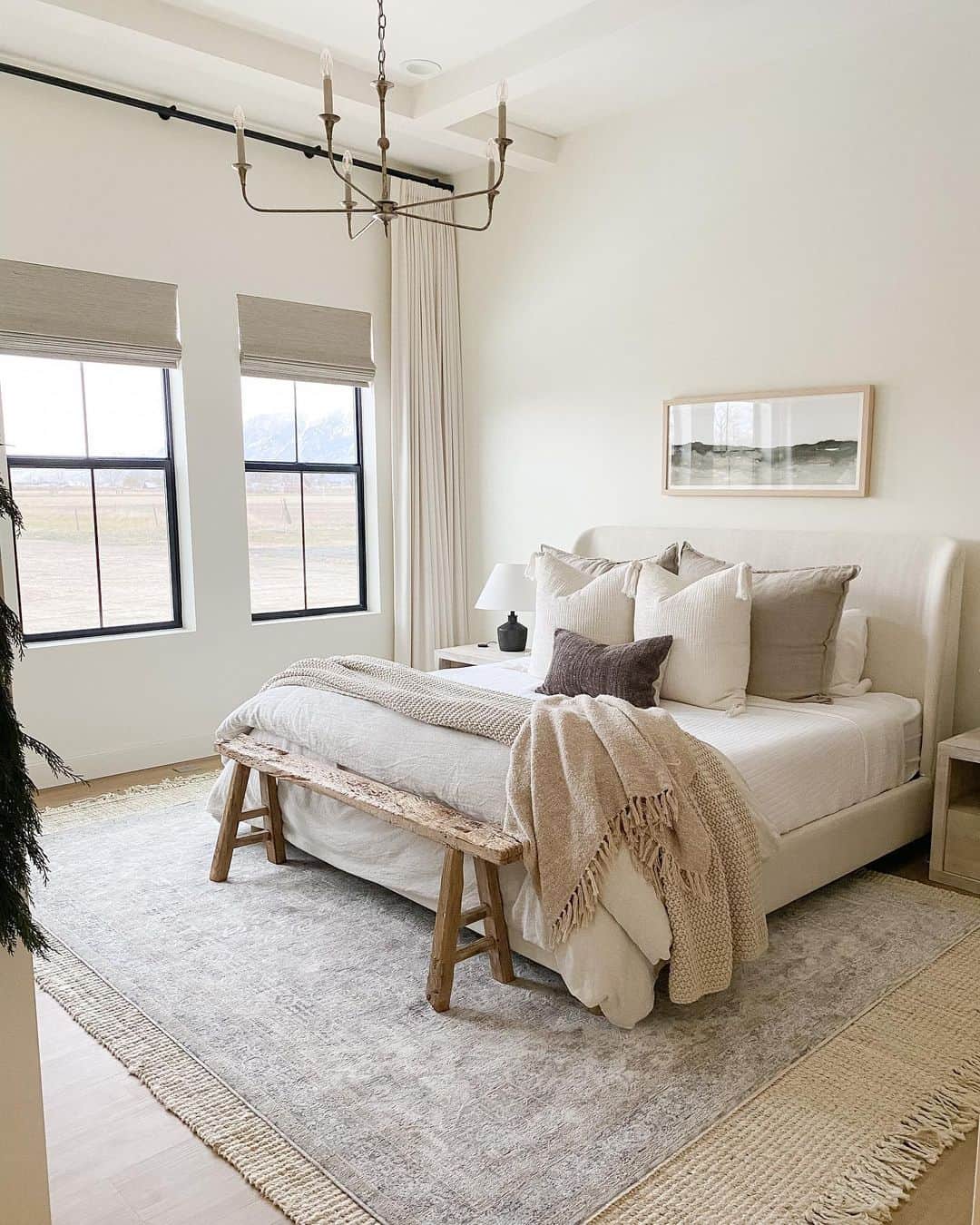 Distressed Wood Bench Adds Rustic Charm to the Foot of the Bed