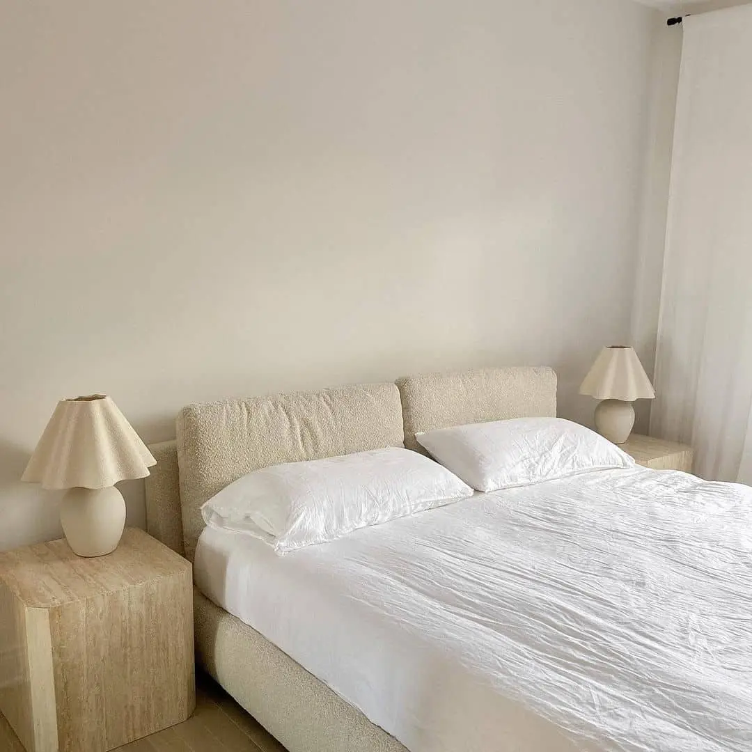 Textured Headboard and Nightstands Create a Cozy, Neutral Retreat