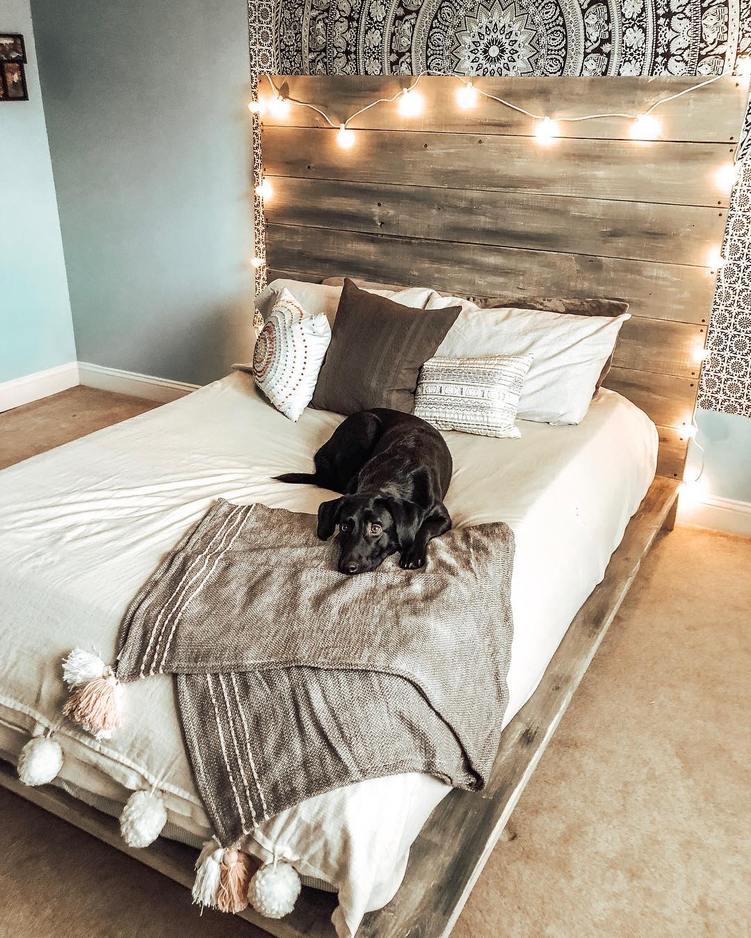 Drape String Lights Over a Rustic Wood Headboard