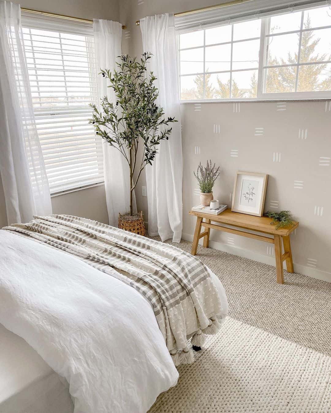 Tall Faux Olive Tree Adds Vertical Interest Near Window