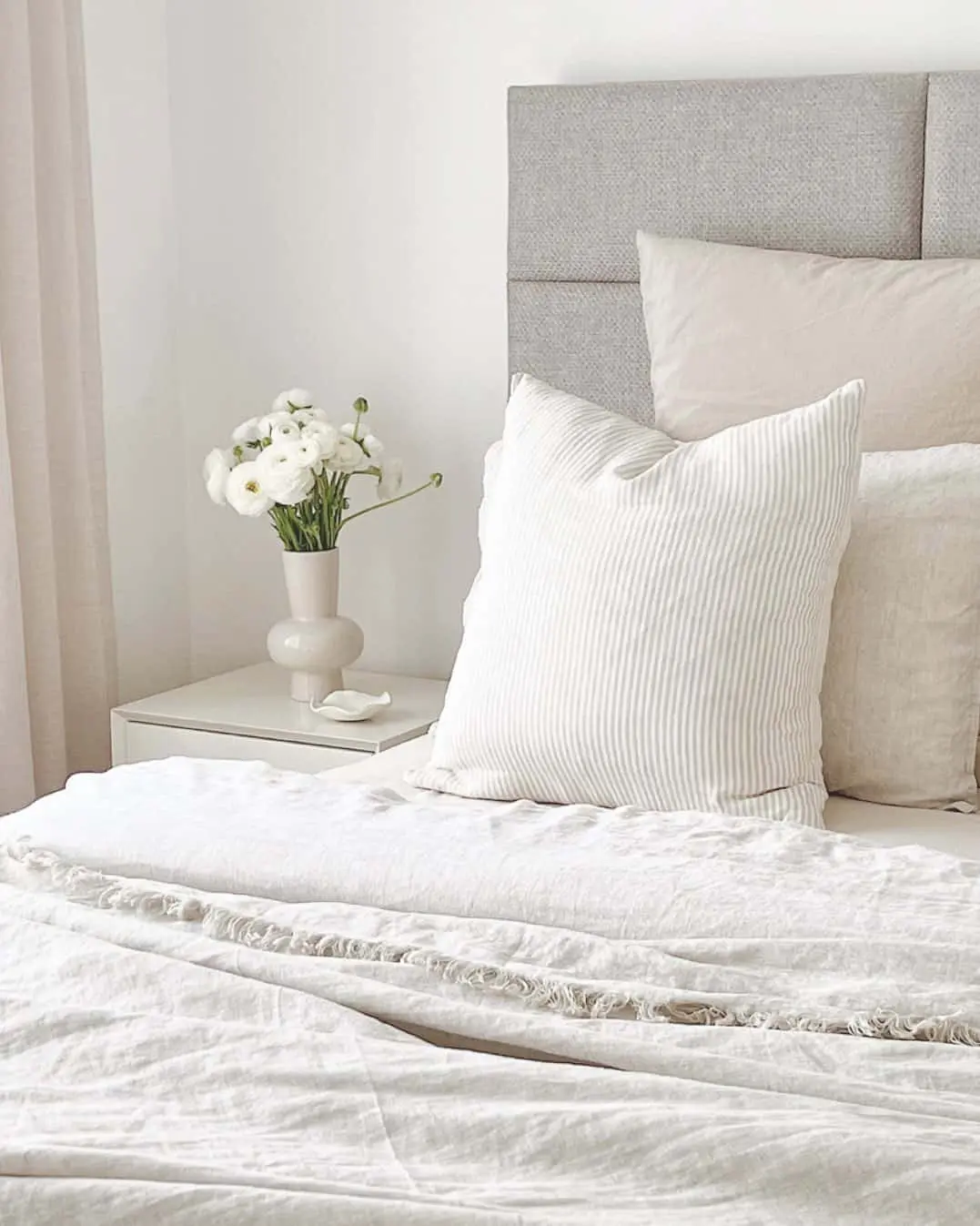 Textured Bedding Adds Softness to a Minimalist Bedroom