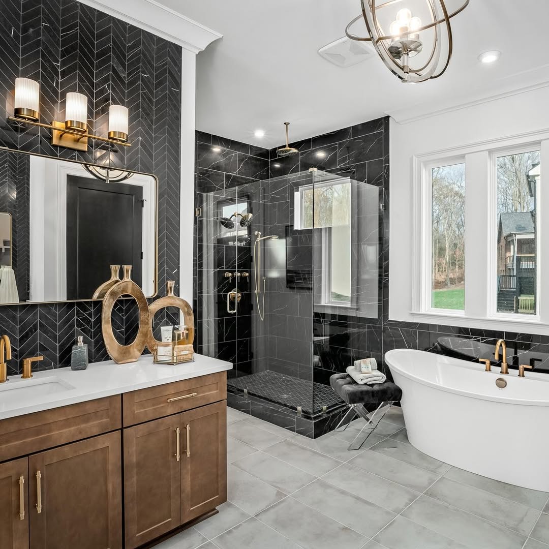 Black Herringbone Tile Creates a Dramatic Focal Point